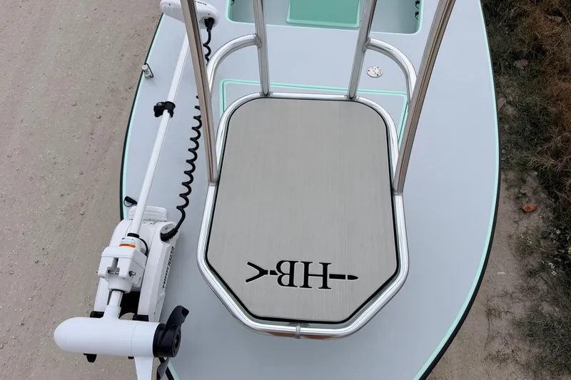 Slide: The Image of 2025 Hell's Bay Professional boat deck with trolling motor and custom platform. - 28