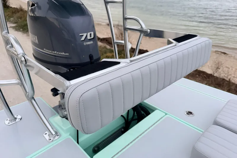 Slide: The Image of 2025 Hell's Bay Professional boat with Yamaha 70 engine, featuring sleek seating design. - 82