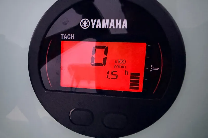 Slide: The Image of Yamaha tachometer display on 2025 Hell's Bay Professional boat, showing 1.5 hours. - 88