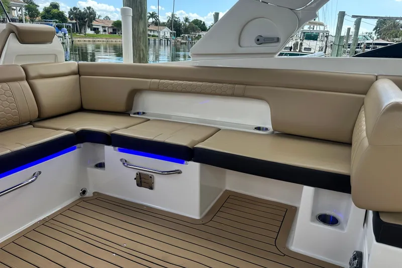 Slide: The Image of Luxurious seating area on 2022 Sea Ray SDX 290 boat with elegant tan upholstery. - 8