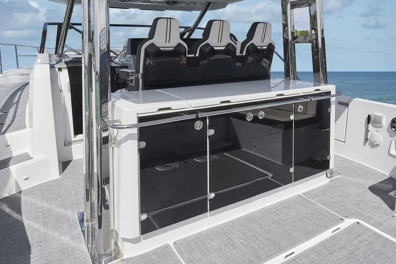 Slide: The Image of 2024 Jeanneau Leader 12.5 yacht interior with modern seating. - 12