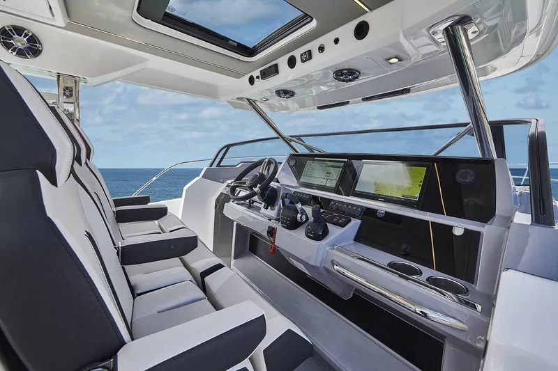 Slide: The Image of Interior of 2024 Jeanneau Leader 12.5 yacht with modern cockpit. - 17
