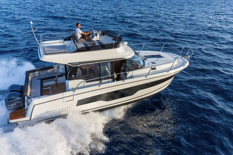 Slide: The Image of Jeanneau NC 1095 Fly 2026 cruising on open sea. - 9