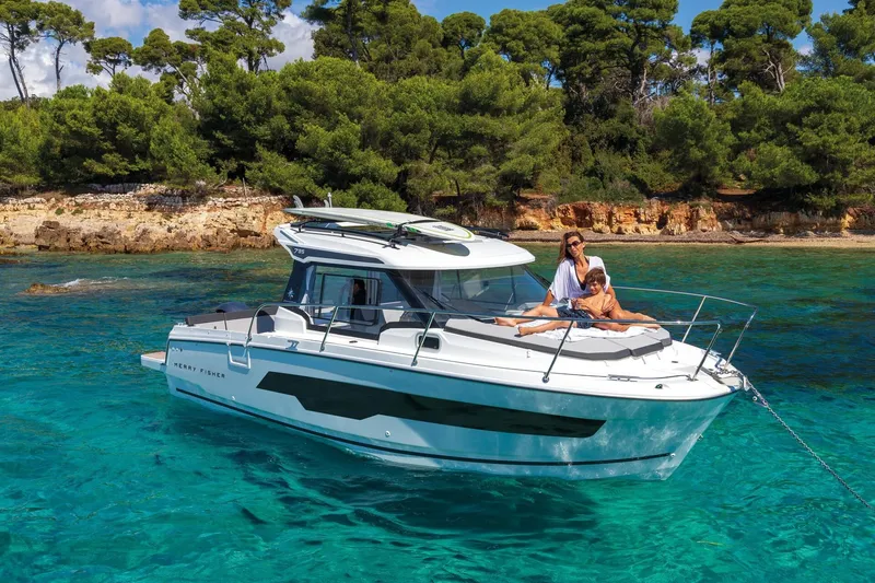 Slide: The Image of Jeanneau NC 795 Series 2 boat on clear water, 2025 model. - 4