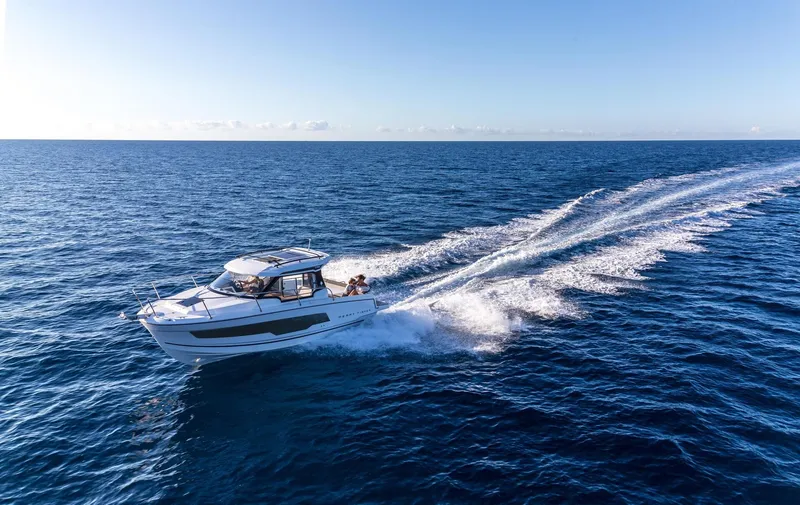 Slide: The Image of Jeanneau NC 795 Series 2 2025 cruising on open sea. - 6