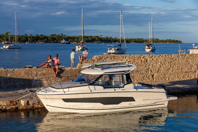 Slide: The Image of Jeanneau NC 795 Series 2 boat docked, 2025 model. - 9