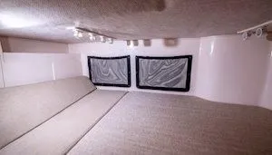 Slide: The Image of Interior of 2026 Grady-White Marlin 300 yacht cabin. - 18