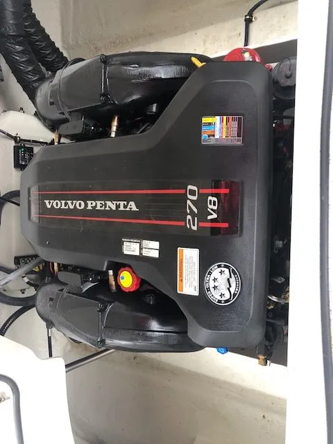 Slide: The Image of Volvo Penta V8 270 engine in a 2014 Cobalt 210 boat. - 12