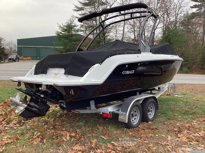 Slide: The Image of Cobalt CS22 boat 2026 parked on trailer outdoors. - 2