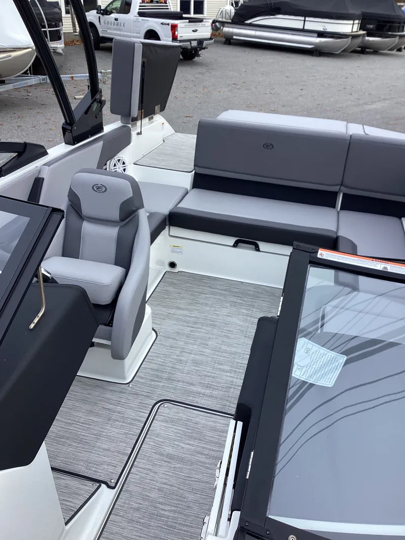 Slide: The Image of Interior of 2026 Cobalt CS22 boat with gray seating. - 7