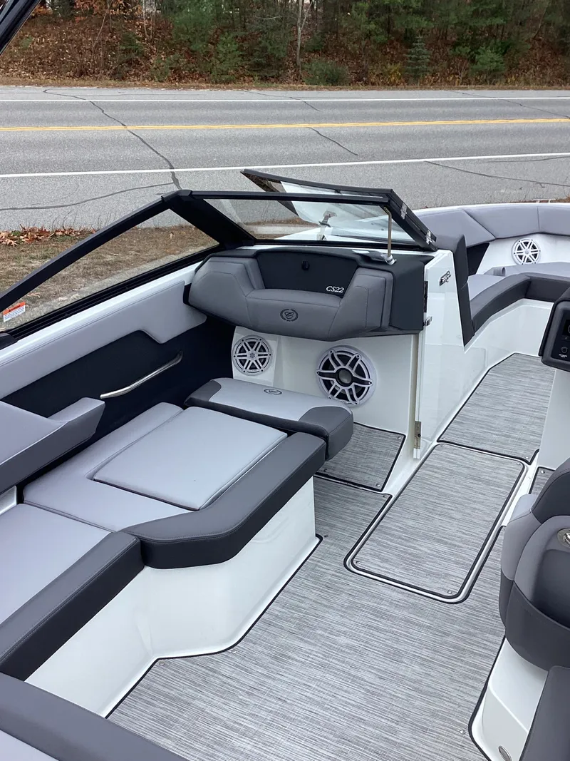 Slide: The Image of Interior of 2026 Cobalt CS22 boat with gray seating. - 8