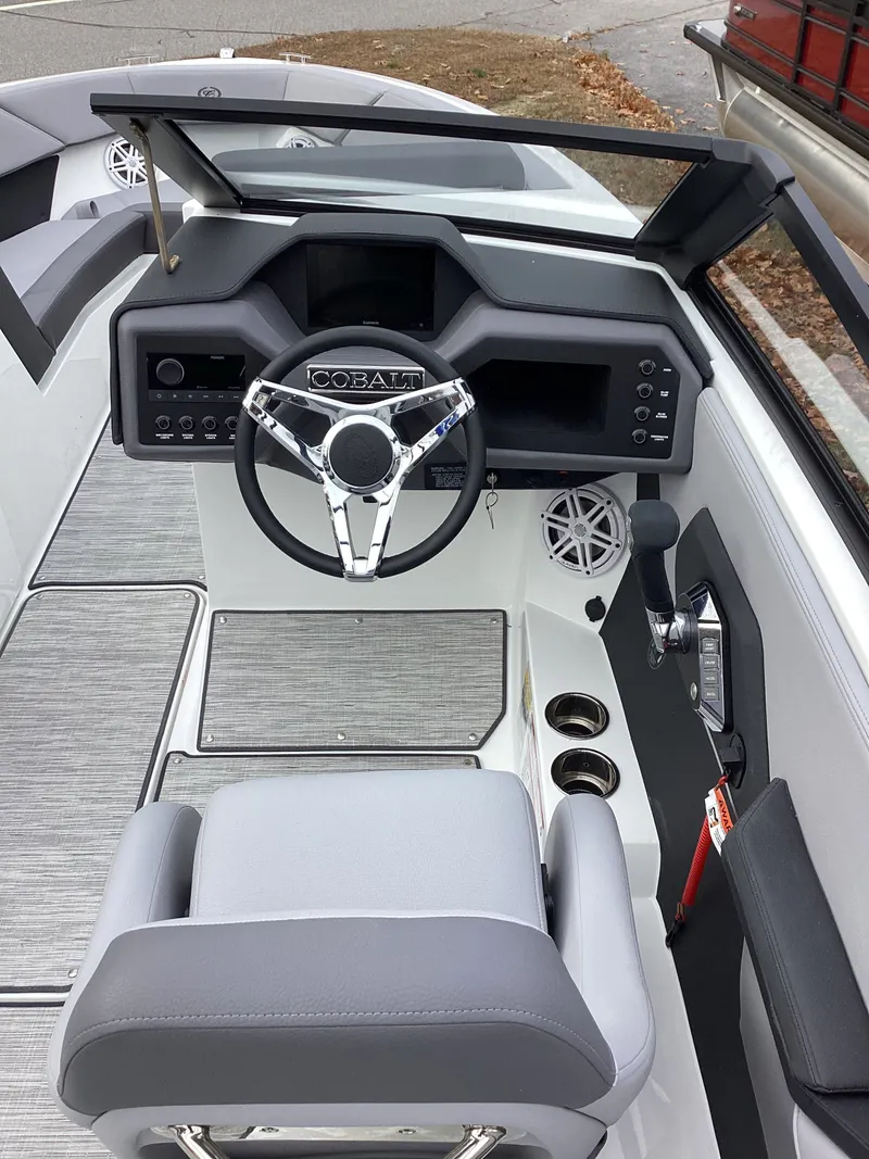 Slide: The Image of Interior view of 2026 Cobalt CS22 boat with modern cockpit. - 9