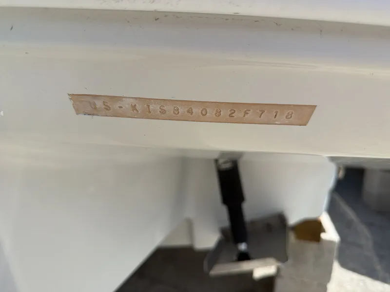 Slide: The Image of Serial number on a 2018 Crownline E24 XS boat hull. - 12
