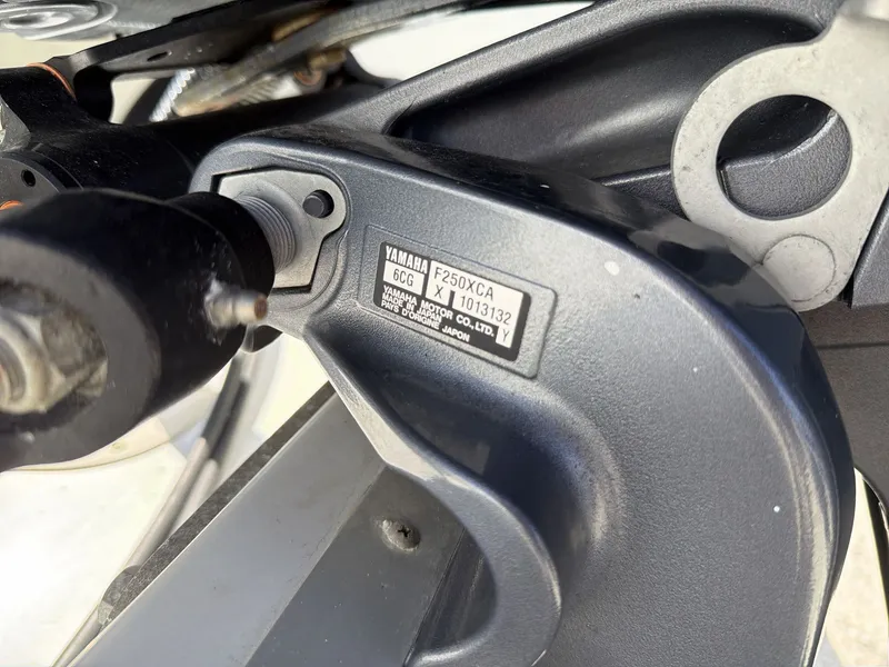 Slide: The Image of Close-up of Yamaha F250XCA engine on a Crownline E24 XS boat. - 13
