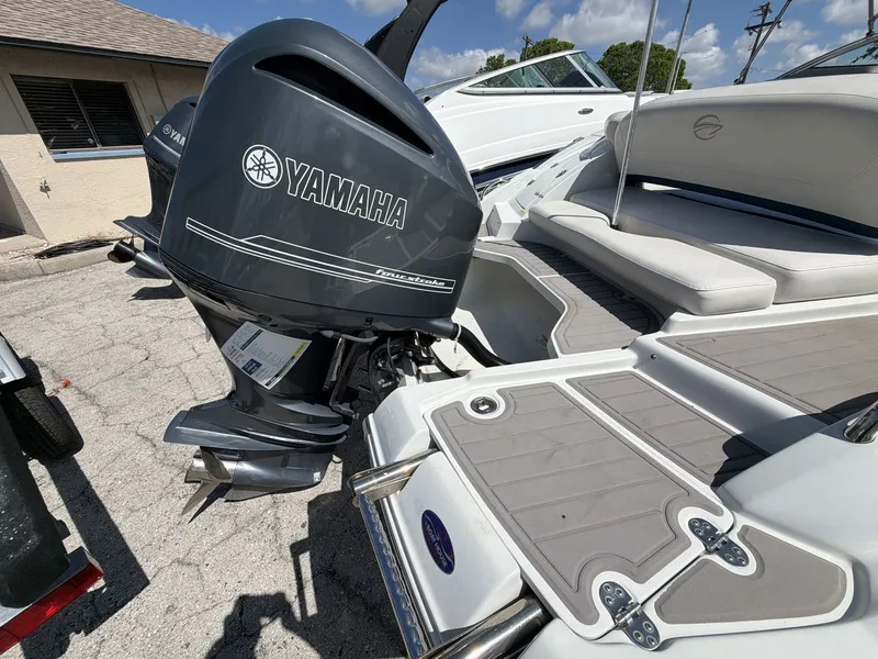 Slide: The Image of 2018 Crownline E24 XS boat with Yamaha outboard motor. - 15
