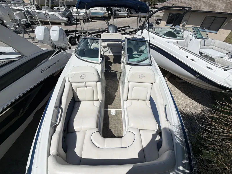 Slide: The Image of 2018 Crownline E24 XS boat with luxurious interior seating. - 17