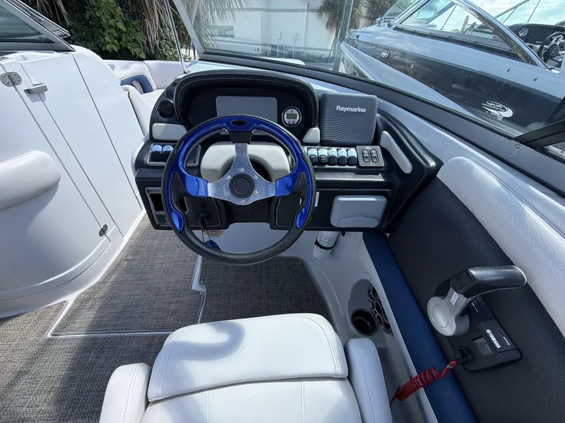 Slide: The Image of Interior view of 2018 Crownline E24 XS boat cockpit. - 19