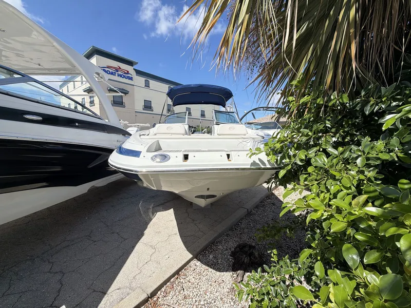 Slide: The Image of 2018 Crownline E24 XS boat outdoors at Boat House. - 3