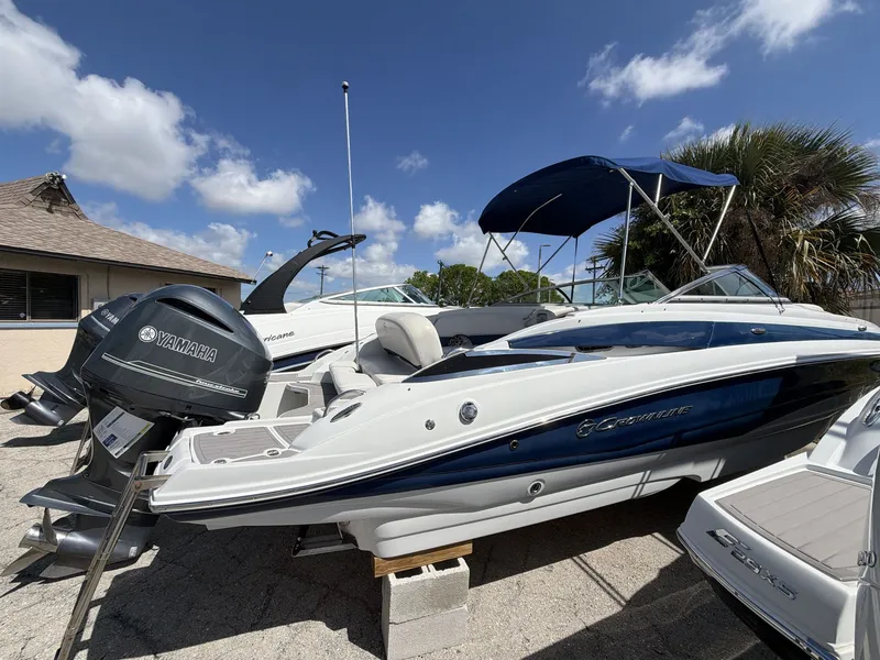 Slide: The Image of 2018 Crownline E24 XS boat with Yamaha engine, blue sky. - 5