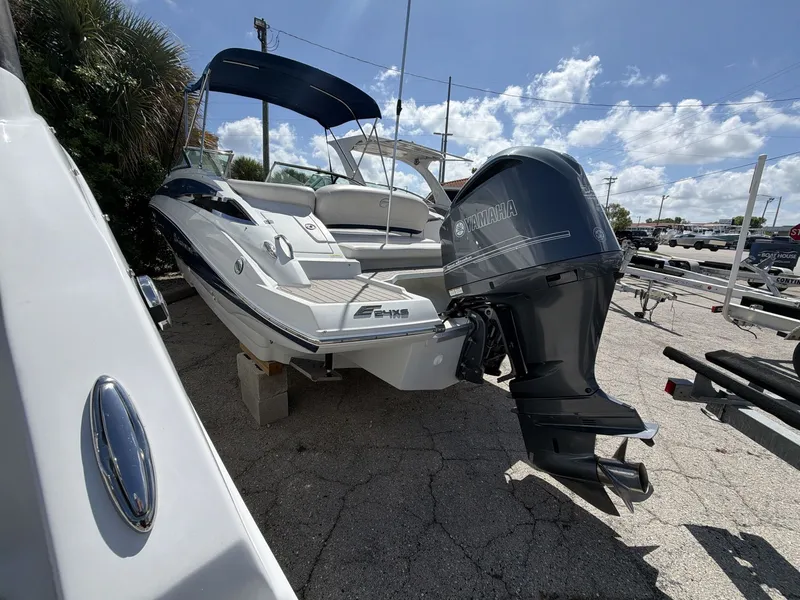 Slide: The Image of 2018 Crownline E24 XS boat with Yamaha outboard motor. - 8