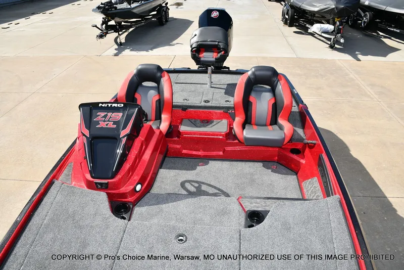 Slide: The Image of 2026 Nitro Z19 XL Pro boat with red and gray seats. - 11