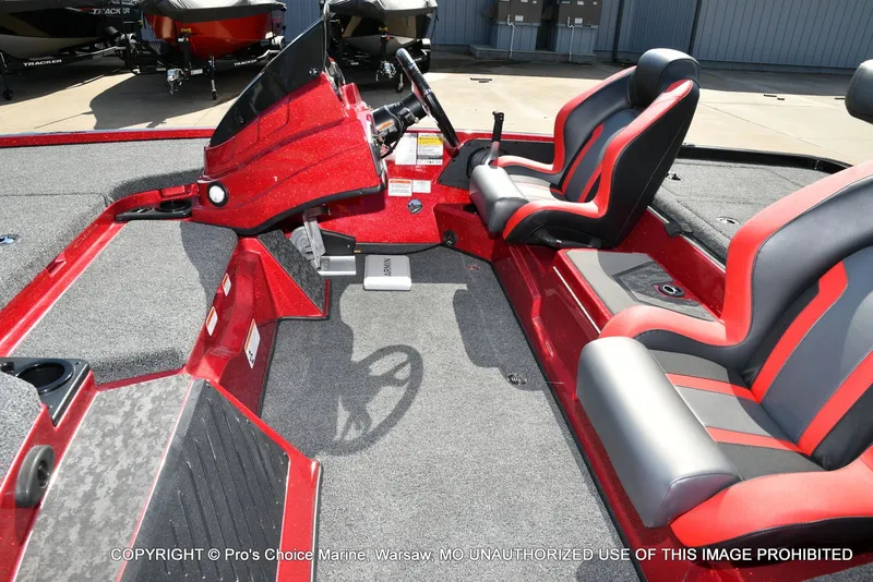 Slide: The Image of Interior of 2026 Nitro Z19 XL Pro with red and gray seats. - 18