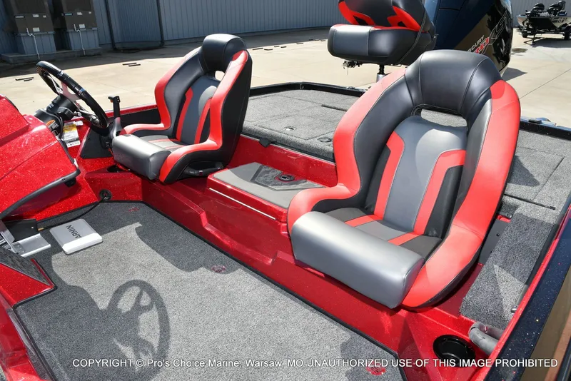 Slide: The Image of Interior of 2026 Nitro Z19 XL Pro with red and gray seats. - 19