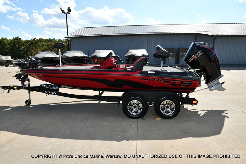 Slide: The Image of 2026 Nitro Z19 XL Pro boat on trailer, side view. - 30