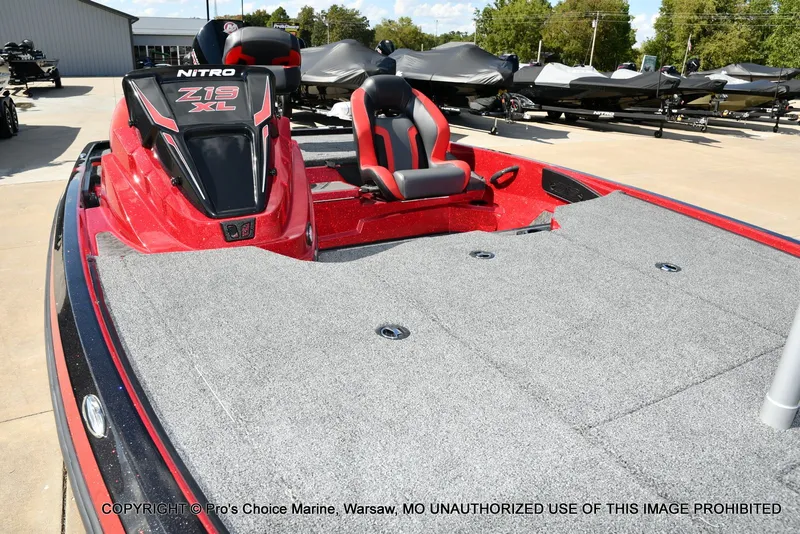 Slide: The Image of 2026 Nitro Z19 XL Pro boat with red and gray interior. - 39