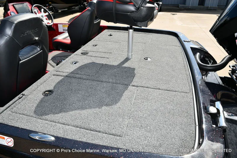 Slide: The Image of 2026 Nitro Z19 XL Pro boat with gray carpeted deck. - 45
