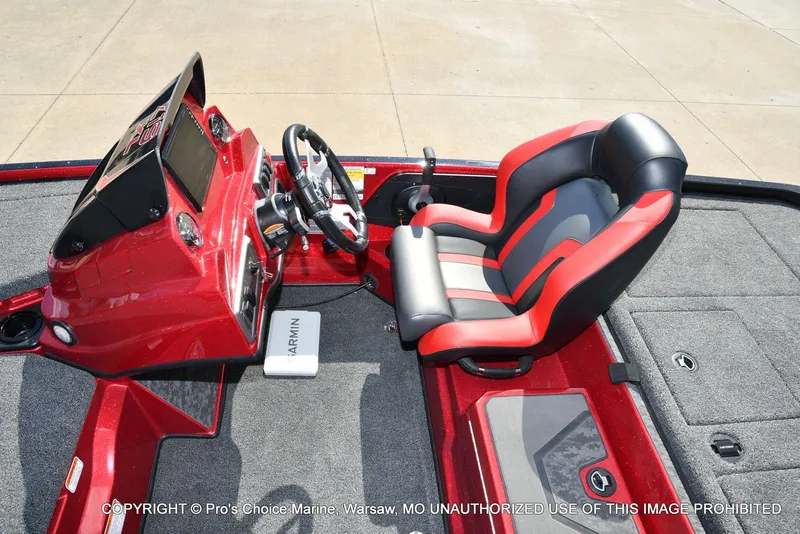 Slide: The Image of Interior of 2026 Nitro Z19 XL Pro with red seat and control console. - 49