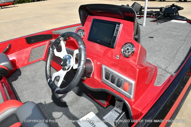 Slide: The Image of Interior of 2026 Nitro Z19 XL Pro with red dashboard. - 9