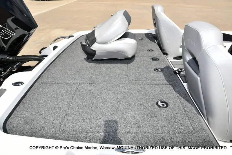 Slide: The Image of 2026 Nitro Z19 XL Pro boat with gray carpeted deck. - 25