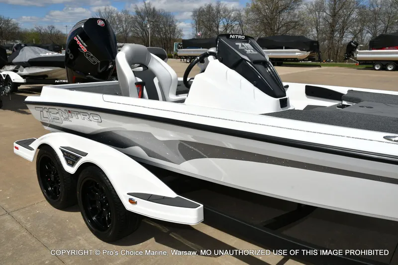 Slide: The Image of 2026 Nitro Z19 XL Pro boat on trailer outdoors. - 3