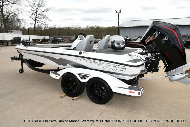 Slide: The Image of 2026 Nitro Z19 XL Pro boat on trailer, side view. - 32