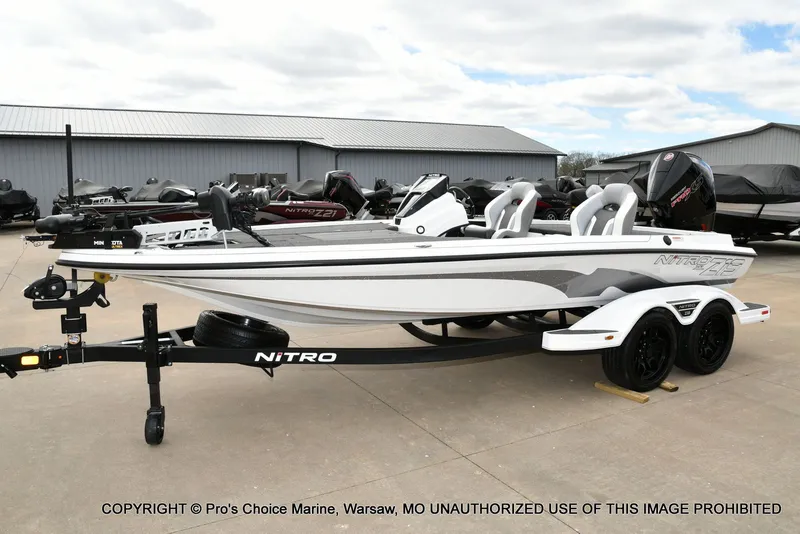 Slide: The Image of 2026 Nitro Z19 XL Pro boat on trailer, side view. - 33