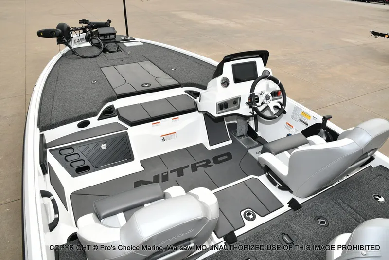 Slide: The Image of Interior of 2026 Nitro Z19 XL Pro boat with steering console. - 41