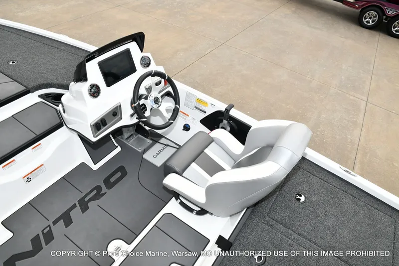 Slide: The Image of Interior view of 2026 Nitro Z19 XL Pro boat with steering console. - 43
