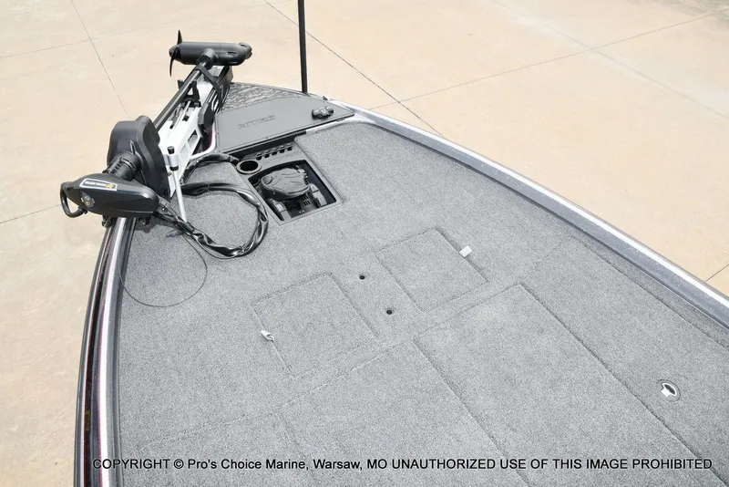 Slide: The Image of 2026 Nitro Z21 XL boat with gray deck and motor. - 11