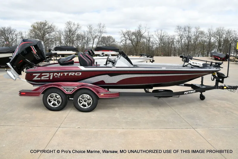 Slide: The Image of 2026 Nitro Z21 XL boat on trailer, side view. - 20