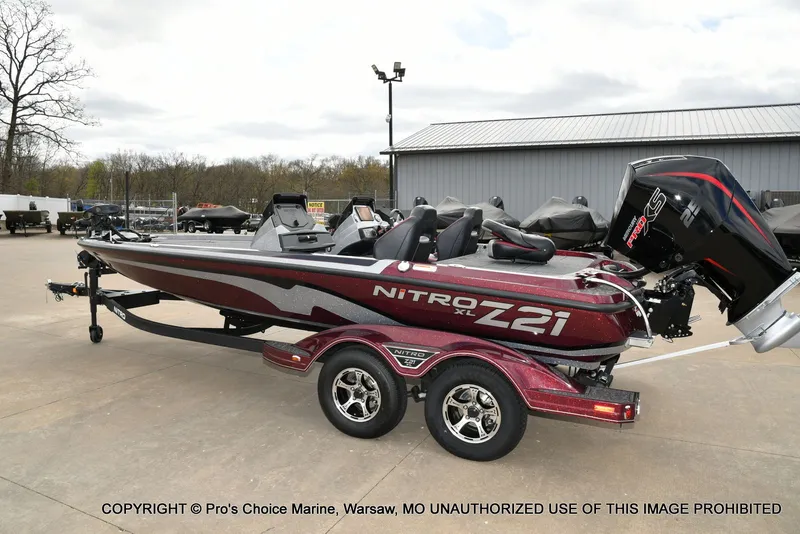 Slide: The Image of 2026 Nitro Z21 XL boat on trailer, exterior view. - 25