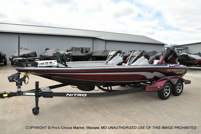 Slide: The Image of 2026 Nitro Z21 XL boat on trailer, side view. - 26