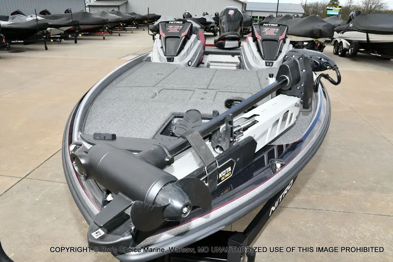 Slide: The Image of 2026 Nitro Z21 XL boat on a parking lot. - 28