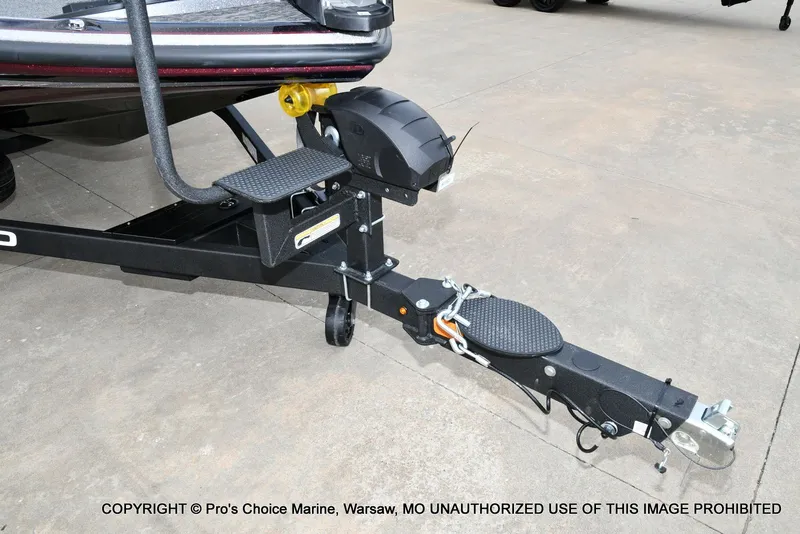 Slide: The Image of Trailer of the 2026 Nitro Z21 XL boat model on concrete ground. - 30