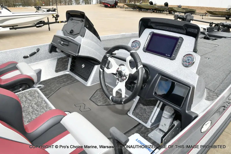 Slide: The Image of Interior of 2026 Nitro Z21 XL with modern control console. - 35