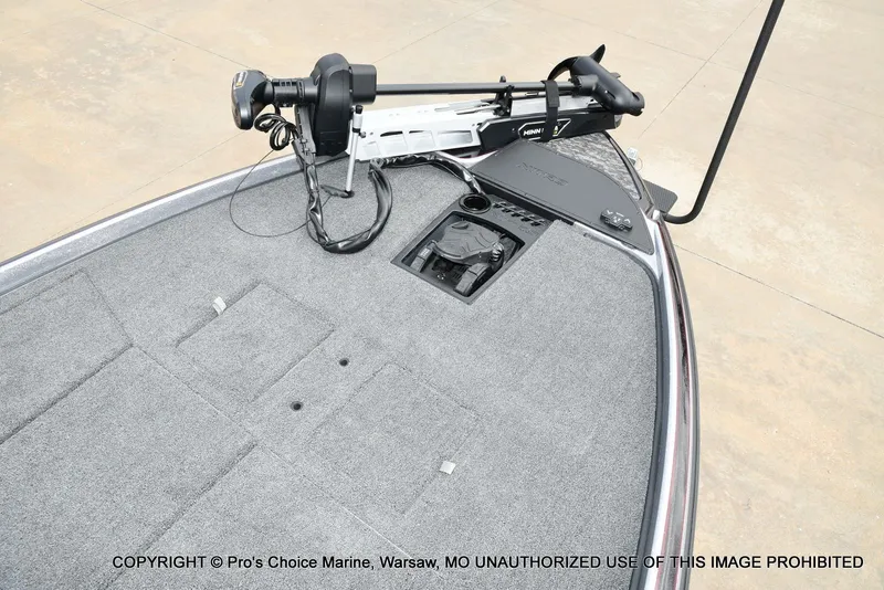 Slide: The Image of 2026 Nitro Z21 XL boat with gray carpeted deck and controls. - 48