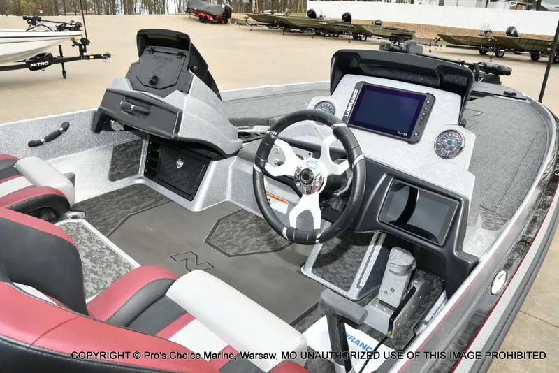 Slide: The Image of Interior view of 2026 Nitro Z21 XL boat with modern control console. - 7