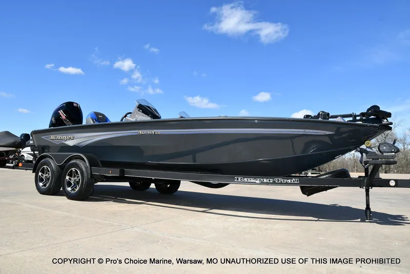 Slide: The Image of 2025 Ranger Alpha 208 Dual Console boat on trailer. - 16