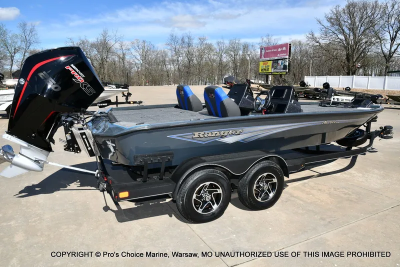Slide: The Image of Ranger Alpha 208 Dual Console boat, 2025 model, parked on trailer. - 18
