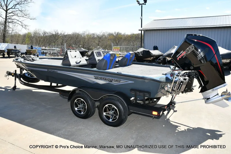 Slide: The Image of Ranger Alpha 208 Dual Console 2025 on trailer outdoors. - 27